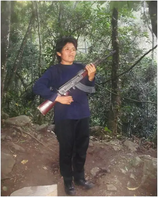 Comrade Laura at the shores of the Purísima River, tributary of the Mantaro River, August 2010